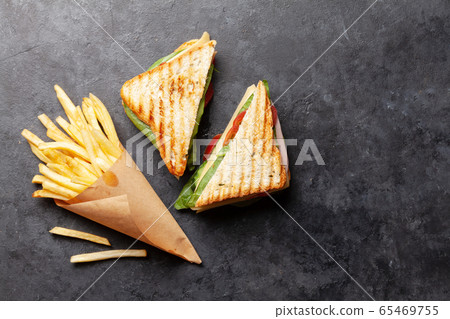 Club sandwich and potato fries chips 65469755