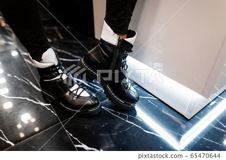 Young modern woman in stylish jeans Young modern woman in stylish jeans 65470644