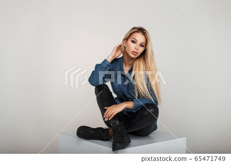 Fashion young blonde girl in stylish denim wear Fashion young blonde girl in stylish denim wear 65471749