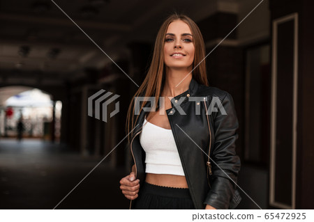 Attractive cute young woman in fashionable clothes 65472925