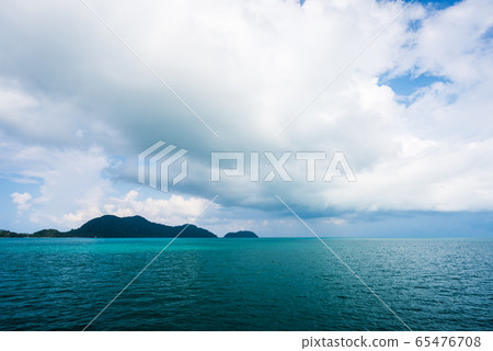 Sea and island on blue sky with cloud background 65476708