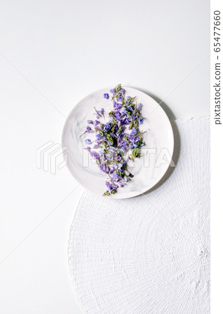 Edible flowers on plate Edible flowers on plate 65477660