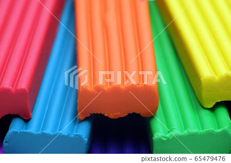 Red, blue,orange, green and yellow plastic clay Red, blue,orange, green and yellow plastic clay 65479476