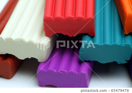 Brown. white, violet, red and blue polymer clay Brown. white, violet, red and blue polymer clay 65479478