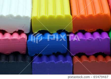 Multi-colored set of plasticine sticks closeup Multi-colored set of plasticine sticks closeup 65479487