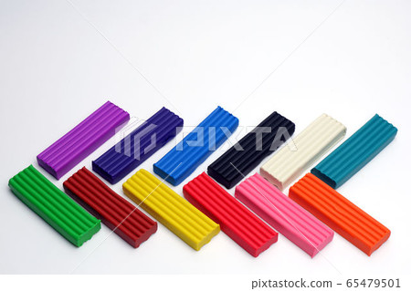 Multi-colored plasticine sticks on white Multi-colored plasticine sticks on white 65479501