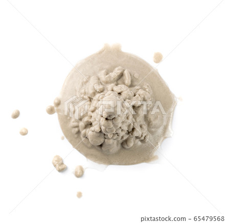 Sandy beach textured pile isolated on white 65479568