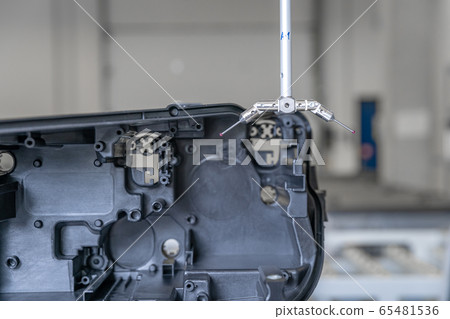 3D measuring device in a factory for the production of plastic castings for the automotive industry 65481536