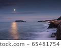 Sea surface shining in the moonlight seen from Shichirigahama parking lot, Enoshima, sky at sunrise 65481754