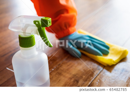 Person cleaning with disinfectant spray Person cleaning with disinfectant spray 65482785