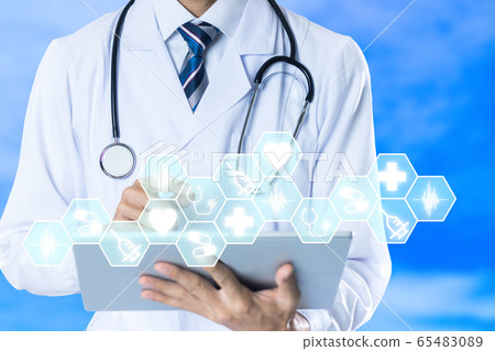 Doctor with electronic medical record 65483089