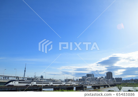 Keisei Skyliner crossing the Sky Tree and Arakawa Bridge Keisei Skyliner crossing the Sky Tree and Arakawa Bridge 65483886