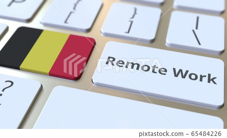 Remote Work text and flag of Belgium on the computer keyboard. Telecommuting or telework related conceptual 3D rendering 65484226