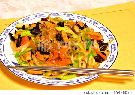 Korean style image with lots of mussels and chapche 65486056