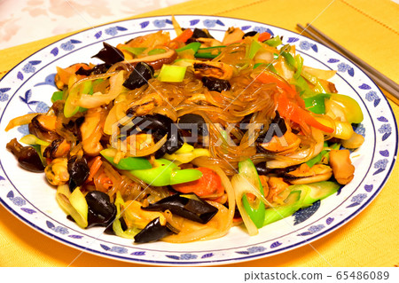Korean style image with lots of mussels and chapche 65486089