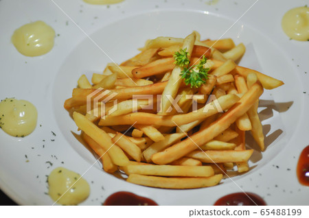 French fries dish or fried potato French fries dish or fried potato 65488199