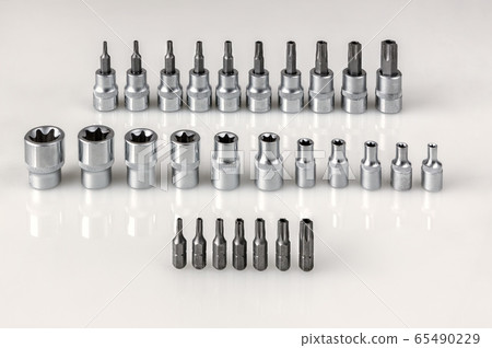 set of nozzles for professional automotive tool on gray background set of nozzles for professional automotive tool on gray background 65490229
