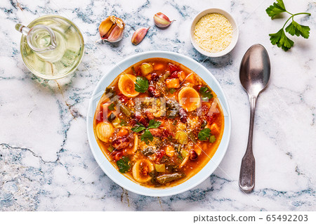 Minestrone, italian vegetable soup with pasta and Minestrone, italian vegetable soup with pasta and 65492203