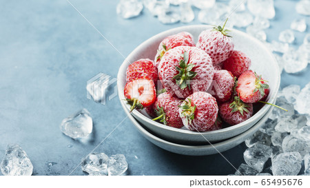Frozen strawberry with crystals of ice 65495676
