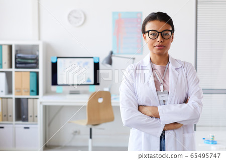 Female doctor at office Female doctor at office 65495747