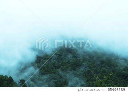 Image of the rainy season sky and the mountain when it rains Image of the rainy season sky and the mountain when it rains 65498389