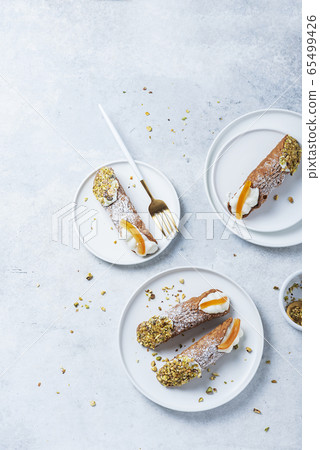 Traditional italian dessert cannoli siciliani Traditional italian dessert cannoli siciliani 65499426