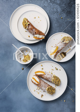 Traditional italian dessert cannoli siciliani 65499428