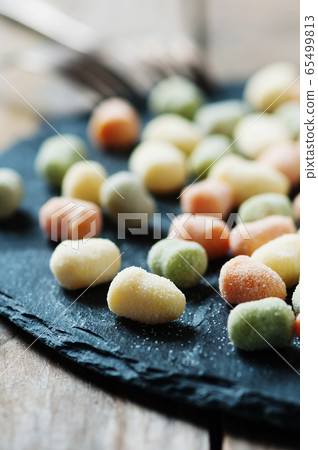Traditional italian gnocchi on the table Traditional italian gnocchi on the table 65499813