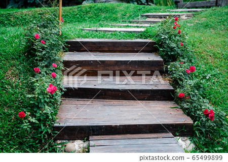 wooden stairs stairstep staircase in garden 65499899