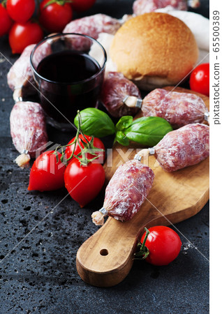 Delicious italian salami on the table Delicious italian salami on the table 65500389