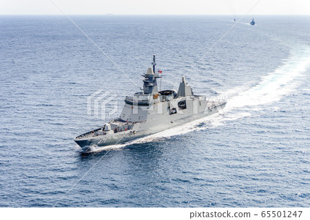 HTMS Bhumibol Adulyadej guided missile stealth frigate of Royal Thai Navy sails in the sea. HTMS Bhumibol Adulyadej guided missile stealth frigate of Royal Thai Navy sails in the sea. 65501247