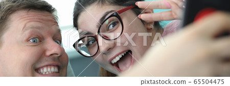 Wife visiting husband in hospital 65504475