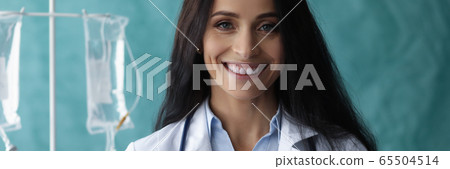 Female with stethoscope on neck Female with stethoscope on neck 65504514