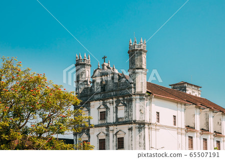 Old Goa, India. Catholic Church Of St. Francis Of Assisi In Sunny Day. Close Up Of Walls Old Goa, India. Catholic Church Of St. Francis Of Assisi In Sunny Day. Close Up Of Walls 65507191