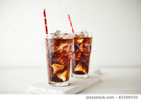 Close up glass of refreshing cola. Close up glass of refreshing cola. 65509550