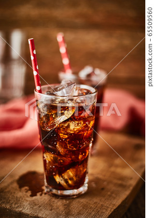 Close up glass of refreshing cola. Close up glass of refreshing cola. 65509560