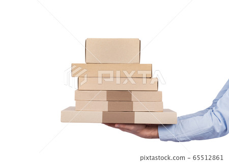 Man holding cardboard boxes isolated on white Man holding cardboard boxes isolated on white 65512861
