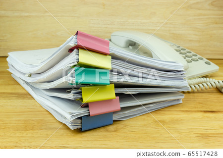 file folder and Stack of business report paper file on the table in a work office, concept document in work office 65517428