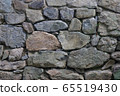 Old stone wall. 65519430