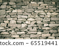 Gray wall of stone. 65519441