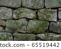Gray wall of stone. 65519442