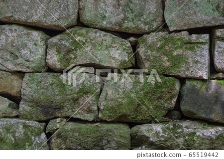 Gray wall of stone. 65519442