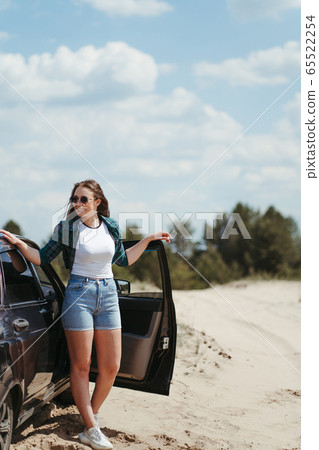 Happy young woman traveling. Road car trip 65522254