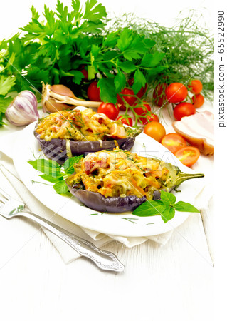 Eggplant stuffed smoked brisket in plate on light Eggplant stuffed smoked brisket in plate on light 65522990