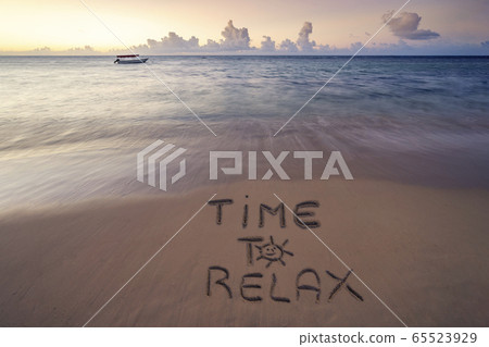 Handwritten Time to relax on sandy beach at sunset Handwritten Time to relax on sandy beach at sunset 65523929