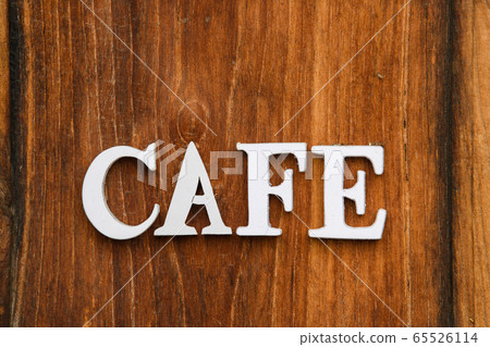 Craft cafe word, made of wooden, on wooden wall. Craft cafe word, made of wooden, on wooden wall. 65526114