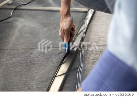 Where the screen door is being reattached 65526169