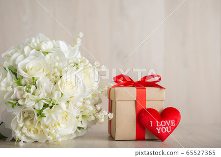 Valentine's Day Concept Gift box, heart and white flower Valentine's Day Concept Gift box, heart and white flower 65527365