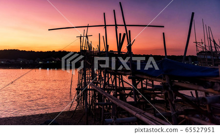 Fisherman fishing tool at dusk, Phang Nga Fisherman fishing tool at dusk, Phang Nga 65527951