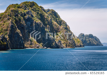 Limestone karst mountains of Matinloc Island. El Nido, Palawan, Philippines 65529165